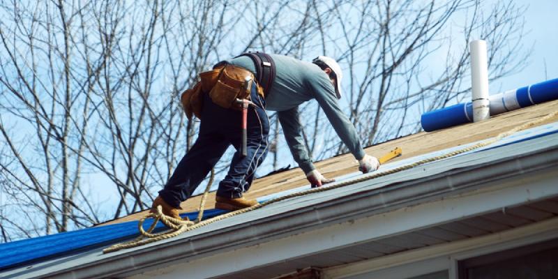 A man repairing a roof